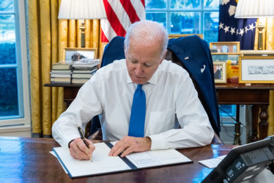 Photo of U.S. President Joe Biden signing an executive order